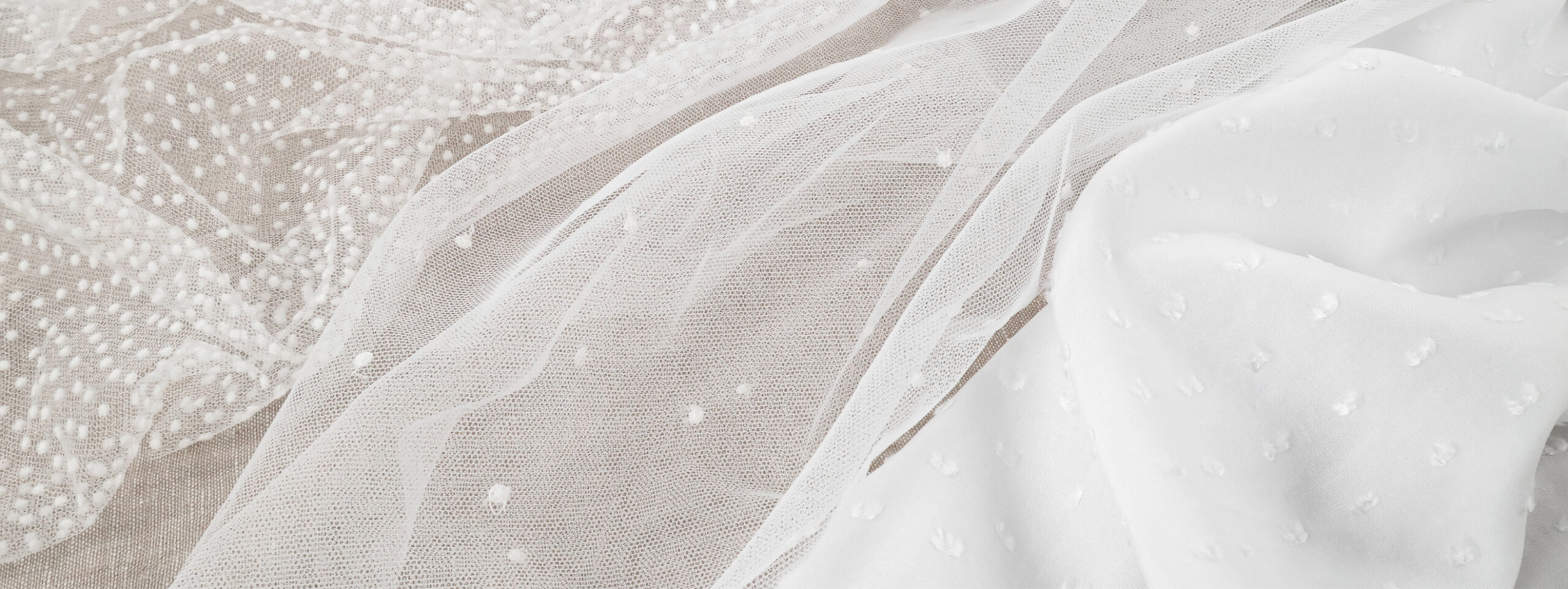 Présentation de tissu plumetis