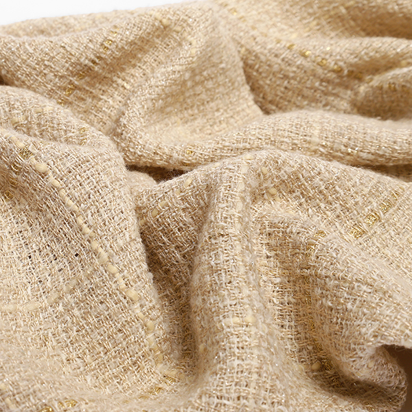 Présentation d'un tissu Tweed en gros plan disponible chez Stragier