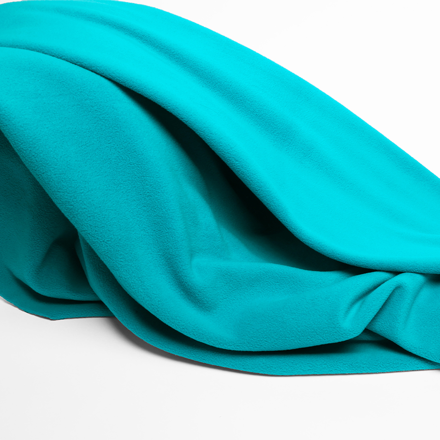 Présentation d'un tissu turquoise en matière polaire super sport
