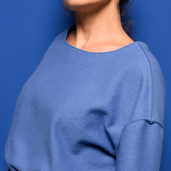 Photo d'un pull dont les coutures sont a cru