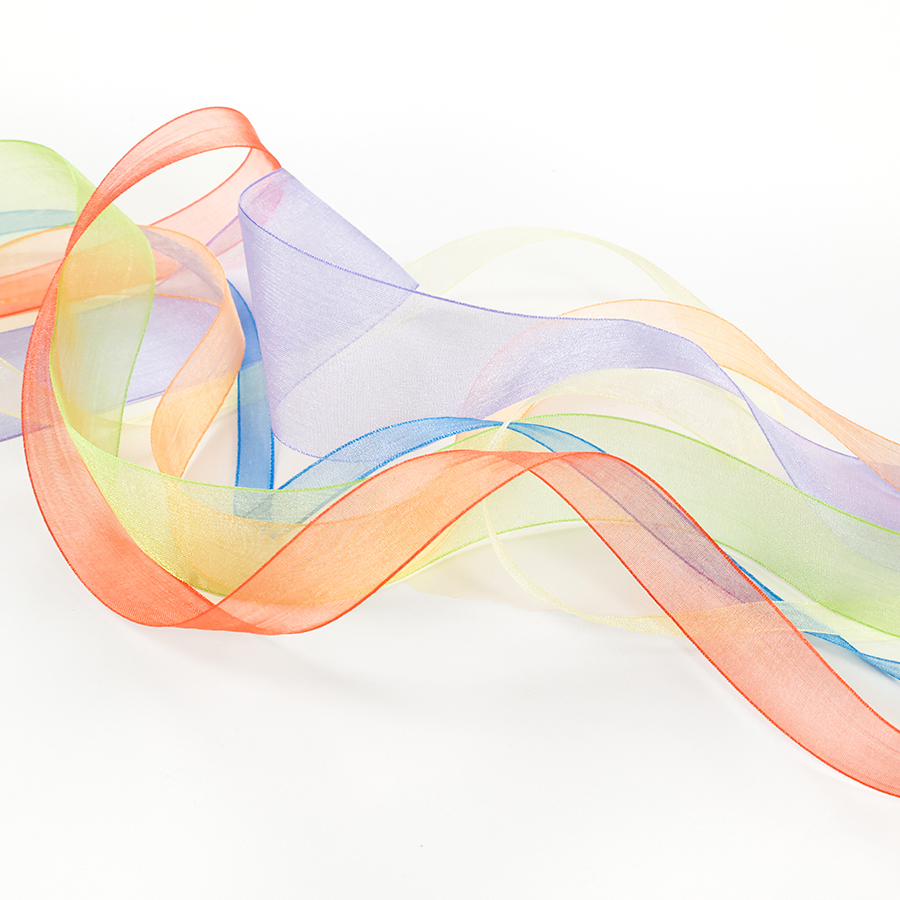 Présentation de plusieurs rubans en mousseline de diamètres différents disponibles chez Stragier