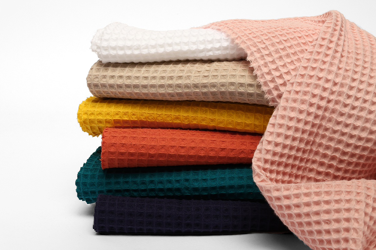 Découvrez nos tissus en nid d'abeille